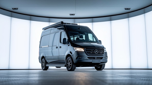 sprinter van with driver reading